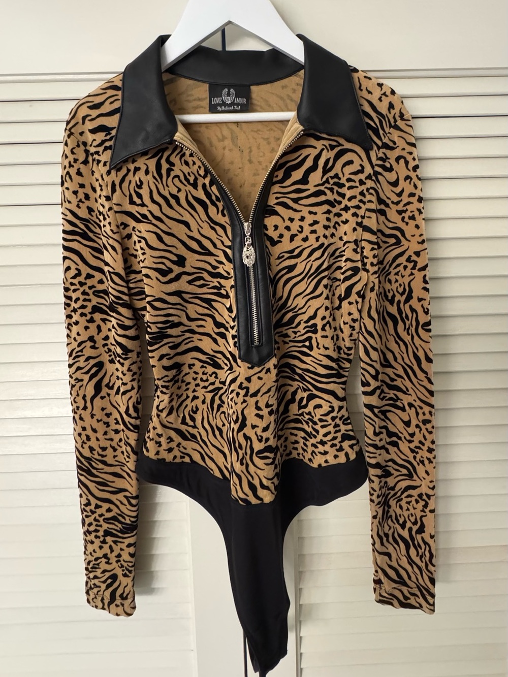 Love Amour Tan and Black Animal-Print Zip Bodysuit